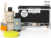 Retique It® Classic Black Brush-On Kit shown with the Classic Black Multipurpose Kit box, brush, Light Wood primer, Classic Black Gel Stain Alternative, and a yellow sponge.
