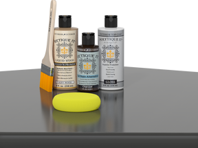Retique It® Charcoal Brush-On Kit with Gloss PolyTique® includes a brush, Light Wood primer, Charcoal Gel Stain Alternative, Gloss PolyTique® top coat, and a yellow sponge.