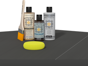 Retique It® Charcoal Brush-On Kit with Matte PolyTique® includes a brush, Light Wood primer, Charcoal Gel Stain Alternative, Matte PolyTique® top coat, and a yellow sponge.