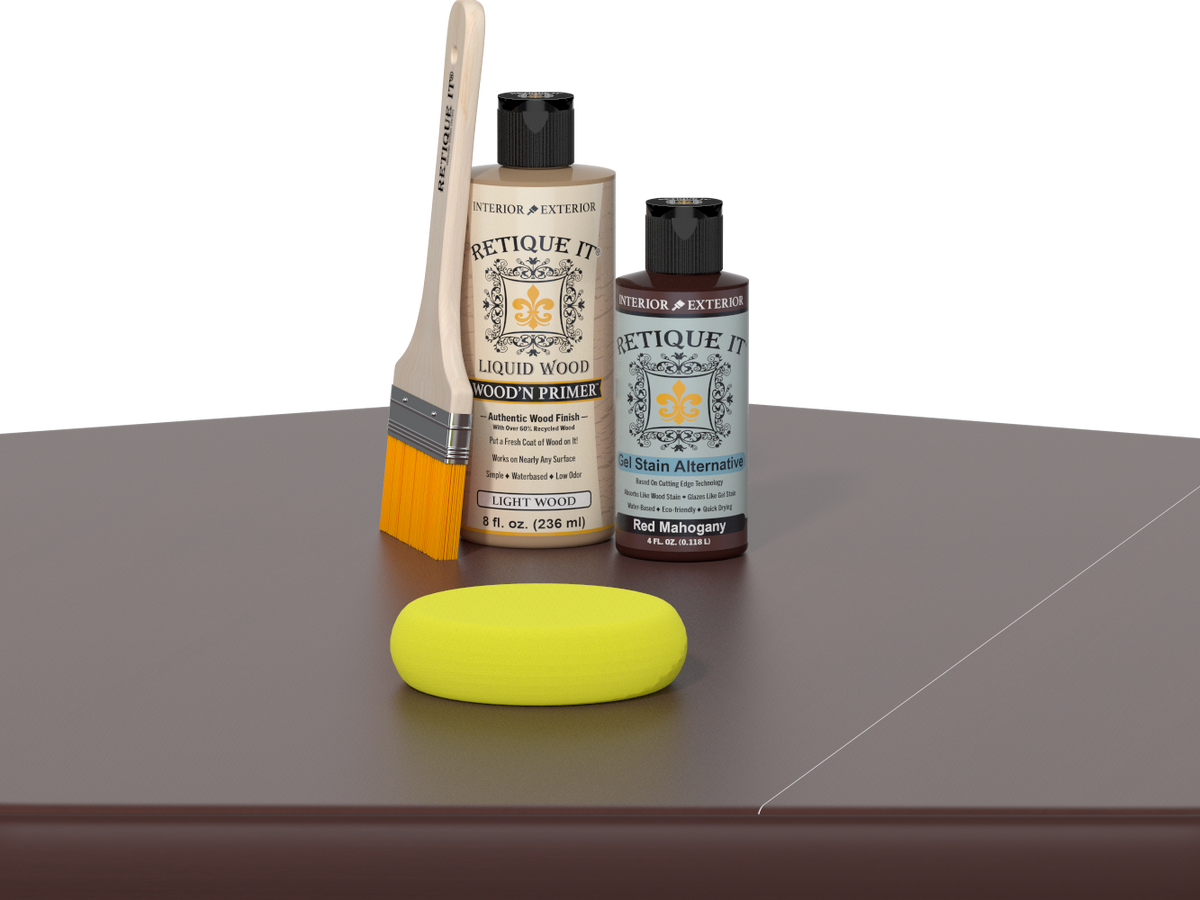 Retique It® Light Wood Wood’n Primer with Red Mahogany Gel Stain Alternative, brush, and yellow sponge on a tabletop.