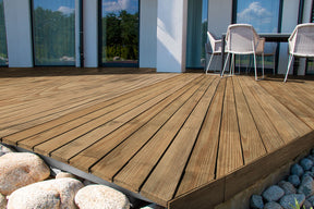 Retique It® Raw Wood Kit in dark wood tone, showing textured, grained wooden planks suitable for decking projects.