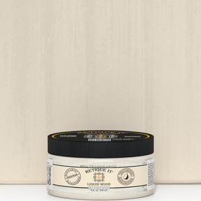 Retique It® Liquid Wood 8oz Bleached interior paint jar positioned in front of a color swatch.