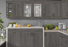 Retique It Wood'n Finish Kit Large in Harbor Gray applied to kitchen cabinets with a grained wood finish.