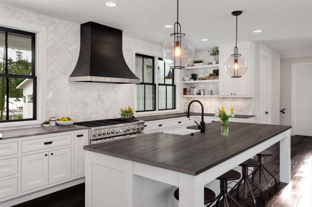 Large Harbor Gray Wood'n Finish Kit from Retique It for wood surfaces, featuring wood grain details on a kitchen countertop.