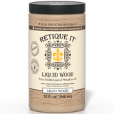 Retique It® Liquid Wood 32oz Light interior paint, showcasing a can of light-colored liquid wood paint for interior surfaces.