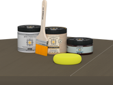 Retique It® Black Walnut Brush-On Kit with Matte PolyTique® includes a brush, Light Wood primer, Black Walnut Gel Stain Alternative, Matte PolyTique® top coat, and a yellow sponge.