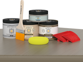 Retique It® Wood'n Finish Kit in Drift Wood, medium size, with satin exterior top coat applied to a table surface.