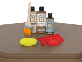 Wood care products including bottles, a brush, and cloths on a wooden surface.