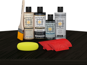 Retique It® Wood'n Finish Kit in Classic Black for exterior top coat, shown on table with wood surface.