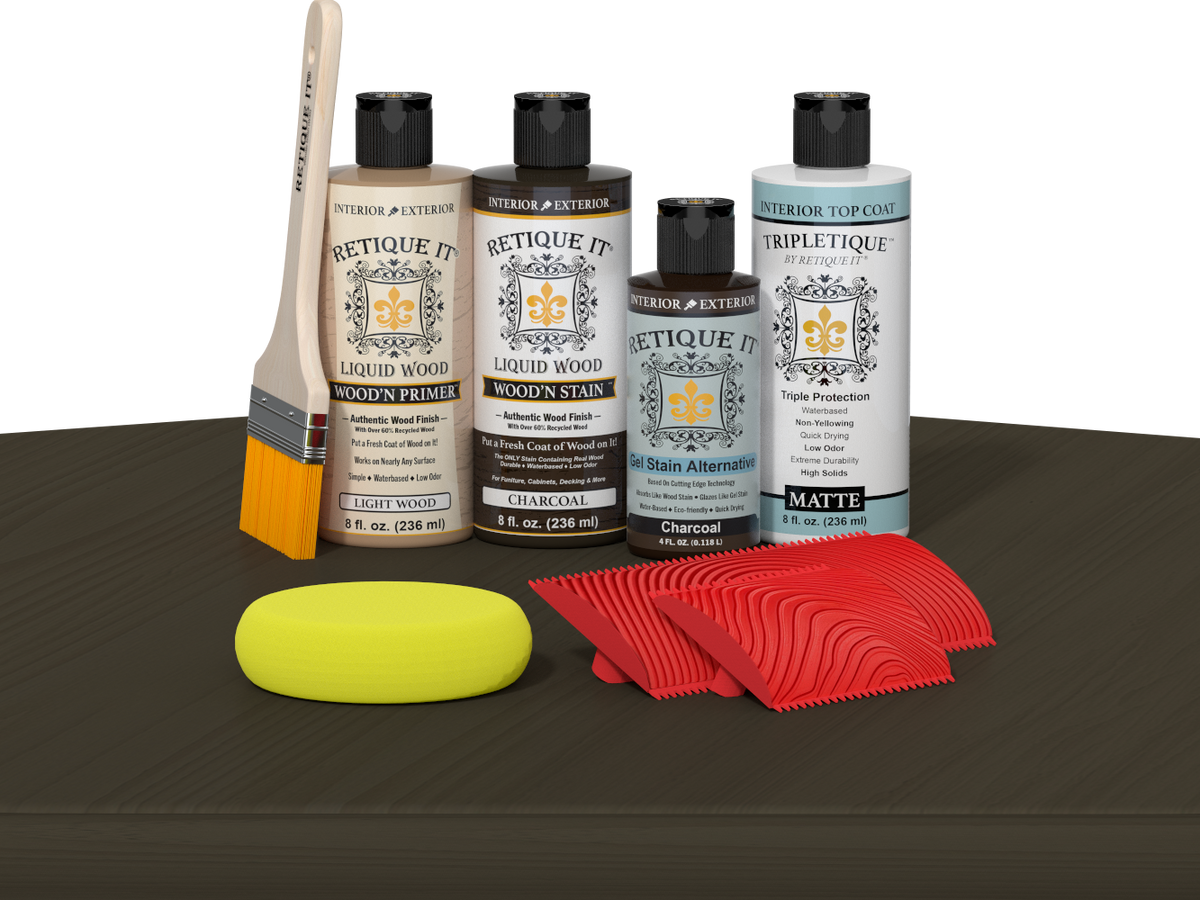 Retique It® Charcoal Wood'n Kit with Light Wood primer, Charcoal stain, Charcoal gel stain alternative, Matte Tripletique® Top Coat, brush, red graining tool, and yellow sponge.