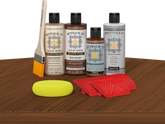 Retique It Wood'n Finish Kit in Vintage Cherry with exterior top coat on a table, showcasing the multi-purpose wood finishing set.