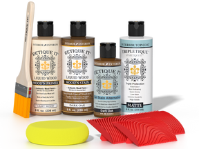 Retique It® Dark Oak Wood'n Kit with Light Wood Primer, Dark Oak Wood'n Stain, Matte TripleTique Top Coat, yellow sponge, red graining tool, and brush.
