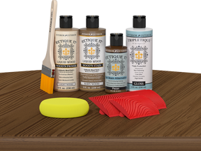 Retique It® Wood'n Kit in Modern Walnut with interior topcoat, displayed on a table for multi-purpose wood finishing.