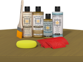 Retique It® Wood'n Finish Kit in Old Oak, interior top coat applied to a wooden table surface, showcasing natural wood grain.