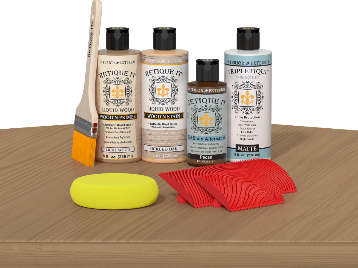 Retique It® Wood'n Finish Kit in Pickled Oak stain displayed on table, showcasing natural wood finish for furniture projects.