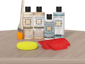 Retique It® Sunbleached Wood'n Kit with Bleached Wood Primer, Pickled Oak Wood'n Stain, Gloss TripleTique Top Coat, White Wash Gel Stain Alternative, yellow sponge, red graining tool, and brush.