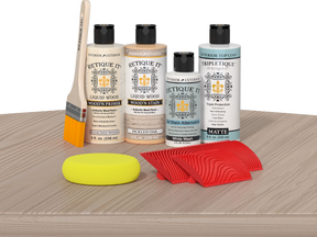 Retique It® Sunbleached Wood'n Kit with Bleached Wood Primer, Pickled Oak Wood'n Stain, Matte TripleTique Top Coat, White Wash Gel Stain Alternative, yellow sponge, red graining tool, and brush.