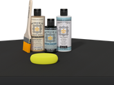 Retique It refinishing kit with Light Wood primer, Classic Black gel stain alternative, matte Tripletique topcoat, a brush and yellow sponge.