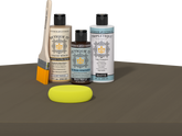 Retique It refinishing kit with Light Wood primer, Black Walnut gel stain alternative, matte Tripletique topcoat, a brush and yellow sponge.