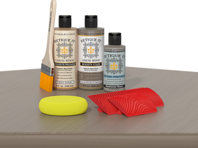 Retique It® Weathered Wood Fireplace Mantel Wood'n Finish Kit stain swatch showing weathered wood tone on sample wood piece
