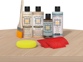 Retique It® Wood'n Finish Kit in White Oak for interior top coat application, shown on a wooden table surface.