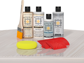 Retique It® Wood'n Finish Kit in White Wash with exterior top coat, featuring wood finish applicator on a table.