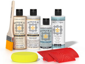 Retique It® White Wash Wood'n Kit with Light Wood primer, White Wash stain, White Wash gel stain alternative, Matte Tripletique® Top Coat, brush, red graining tool, and yellow sponge.