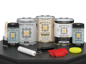 Retique It® Wood'n Kit Multi-purpose Interior Top Coat in Classic Black, satin finish, shown in a paint palette with wood surface.