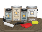 Retique It® Wood'n Cabinet Kit with weathered wood grain stain and 48 cabinet doors displayed on a table.