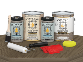 Retique It® Wood'n Cabinet Kit with weathered wood grain stain and 48 cabinet doors displayed on a table.