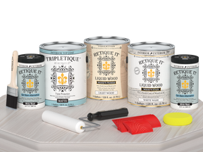 Retique It® Wood'n Finish Kit in White Wash with Matte top coat, includes four large interior wood finishing supplies on a table.