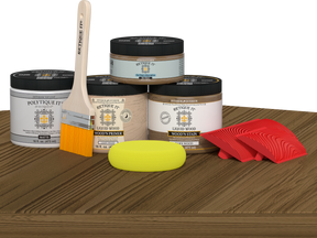 Retique It Wood'n Kit (Med) barn wood exterior topcoat with brushes and applicator on table for multi-purpose wood finishing.