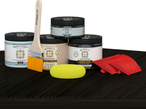 Retique It Wood'n Finish Kit double size in classic black stain on table surface, showcasing wood finishing process and product appearance.