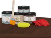 Retique It® Wood'n Finish Kit in Java stain, double size, displayed on a table, showcasing wood finishing and staining tools.