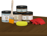 Retique It® dark pecan countertop stain kit applied to a kitchen island, showcasing rich wood finish and natural grain detail.