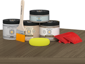 Retique It Weathered Wood Wood'n Finish Front Door Kit stain displayed on a table, showcasing natural weathered wood appearance.