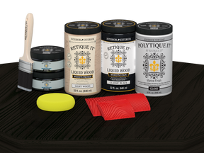 Retique It Wood'n Finish Front Door Kit (Double) in Classic Black with glossy stain finish, displayed on a table.