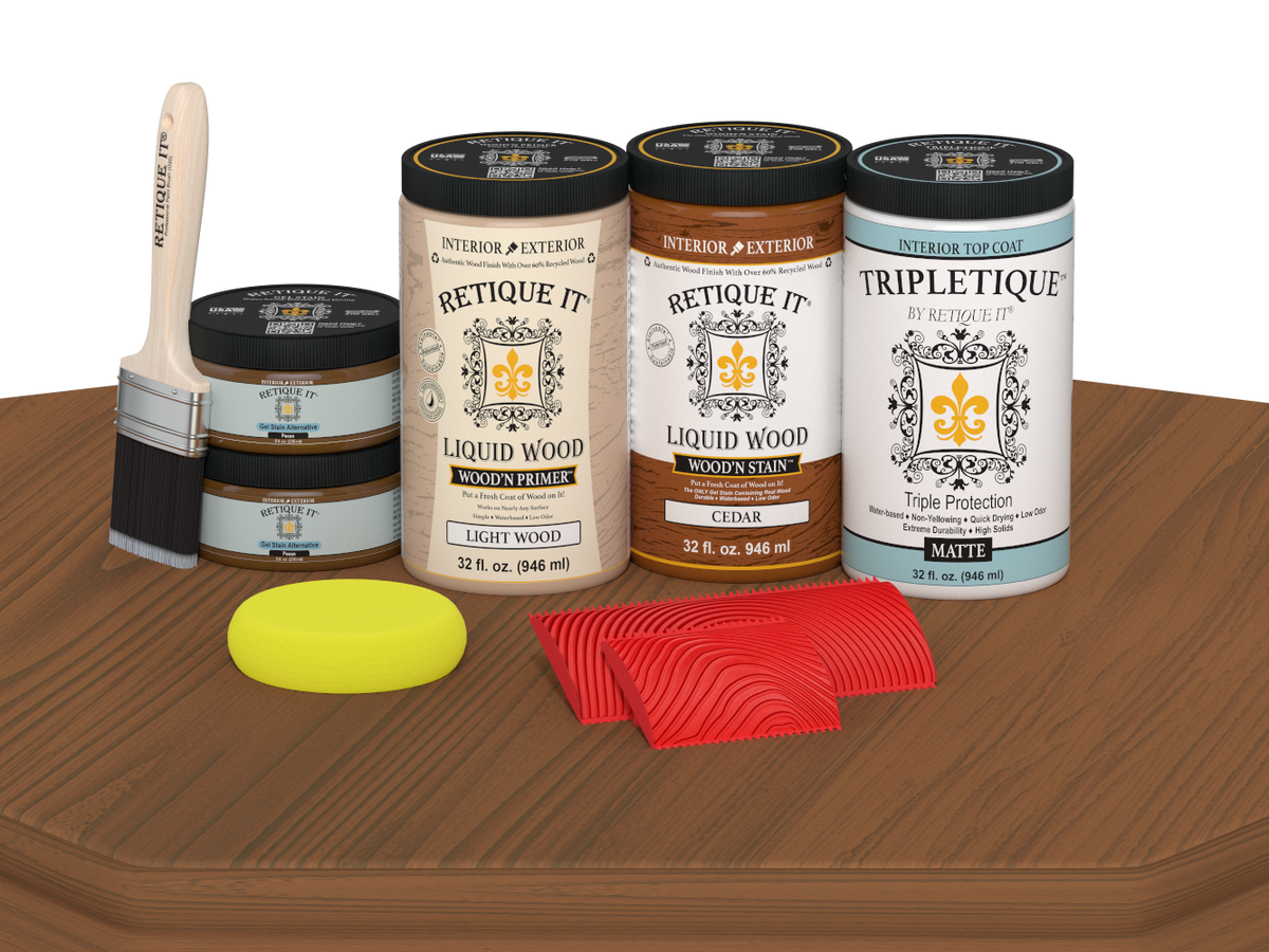 Retique It® Wood'n Finish Kit in cedar stain with four large matte wood stain bottles displayed on a table.