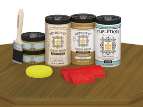 Retique It® Wood'n Finish Kit with four large Old Oak stain samples on a tabletop in matte finish.