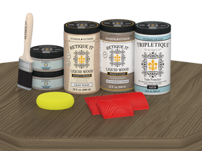Retique It® Wood'n Cabinet Kit with weathered wood stain, 12 grained cabinet doors on a satin finish surface.