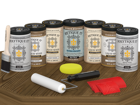 Retique It Wood'n Door Kit in barn wood stain with glossy finish, suitable for front and garage barn doors, displayed on table.