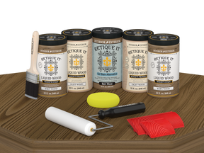 Retique It Barn Wood Kit with Liquid Wood, Barn Wood Gel Stain Alternative, yellow sponge, red graining tool, roller, and brush.