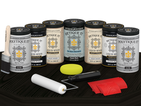 Retique It Wood'n Door Kit in Classic Black stain, featuring gloss finish for front and garage doors, displayed on a table.