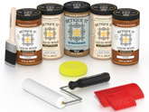 Retique It Cedar Wood'n Kit featuring Cedar Liquid Wood stain, Light Wood primer, Pecan Gel Stain Alternative, paint brush, white roller, yellow sponge, and red graining tools.