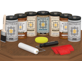 Retique It Wood'n Door Kit in cedar stain with matte finish, suitable for front and garage doors, displayed on a table.