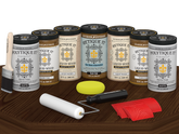 Retique It Wood'n Door Kit in Dark Oak stain for front and garage doors, matte finish displayed on a table.