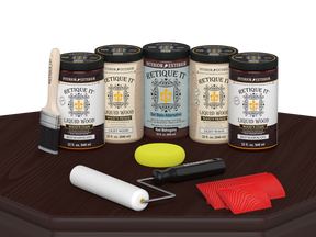 Retique It Wood'n Cabinet Kit with 24 red mahogany stained cabinet doors, displaying wood grain and stain finish on a table.