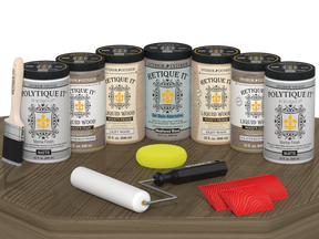 Retique It Wood'n Door Kit in Weathered Wood stain with matte finish, suitable for front and garage doors, displayed on a table.