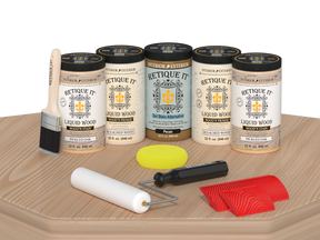 Retique It® White Oak Kit with Liquid Wood®, Pecan Gel Stain Alternative, yellow sponge, red graining tool, roller, and brush.