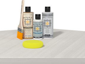 Retique It® Wood'n Finish Kit with white wash exterior top coat, showing a table with smooth, white washed wood finish.